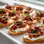 Million Dollar Bacon Goat Cheese Appetizer Log with Crostini and Hot Honey Drizzle Recipe
