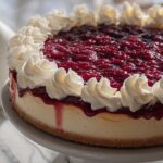 Creamy Baked Raspberry Cheesecake with Vibrant Raspberry Topping Recipe